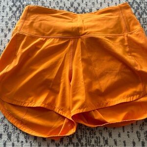 Lululemon high rise speed ups orange